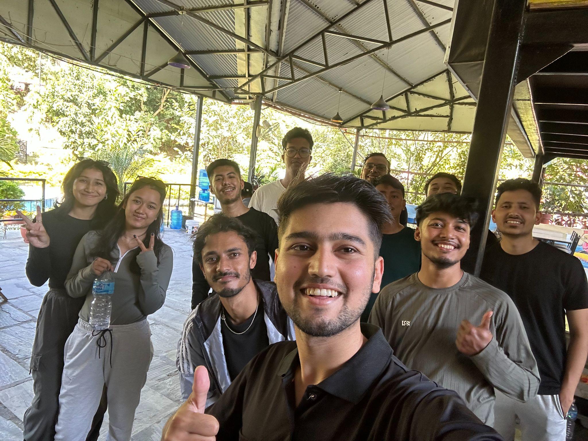 Post-rafting group selfie at the resort